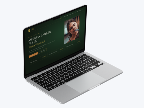 Web Medusa Barber na notebooku